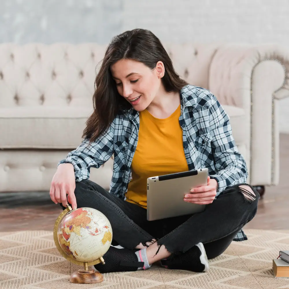 Student using a world globe, representing Shopify SEO reach for Australian businesses